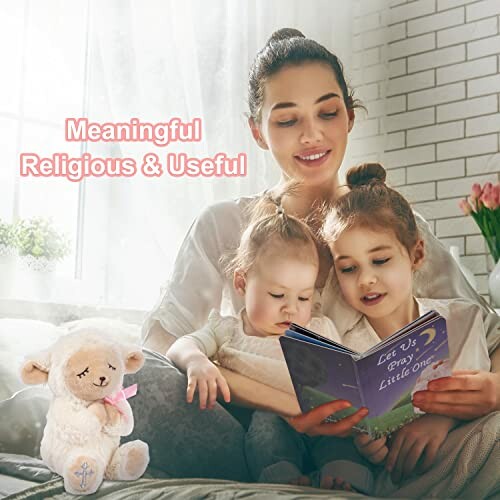 Mother reading a book to two children with a stuffed lamb nearby.